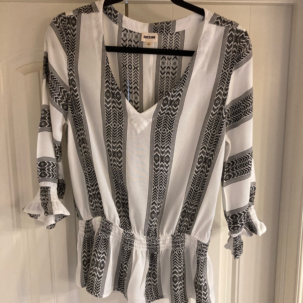 Black and white Boho stripe blouse with ruffle hem